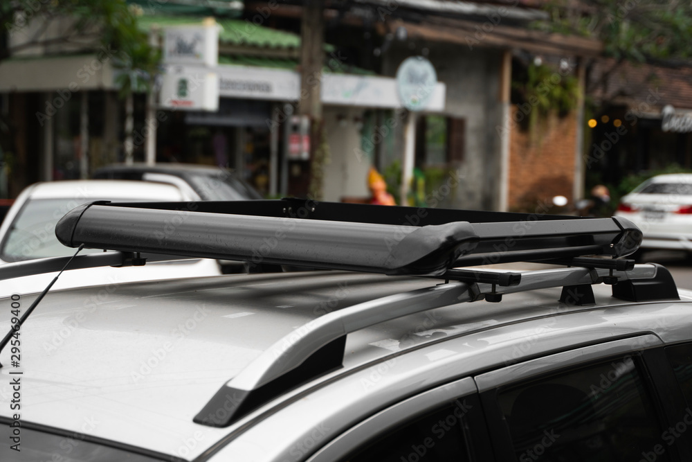 Trunk on the roof of the car for attaching large loads. Roof trunk for bicycle transportation, traveling by car.
