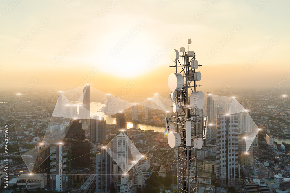 Telecommunication tower with 5G cellular network antenna on city background - obrazy, fototapety, plakaty 