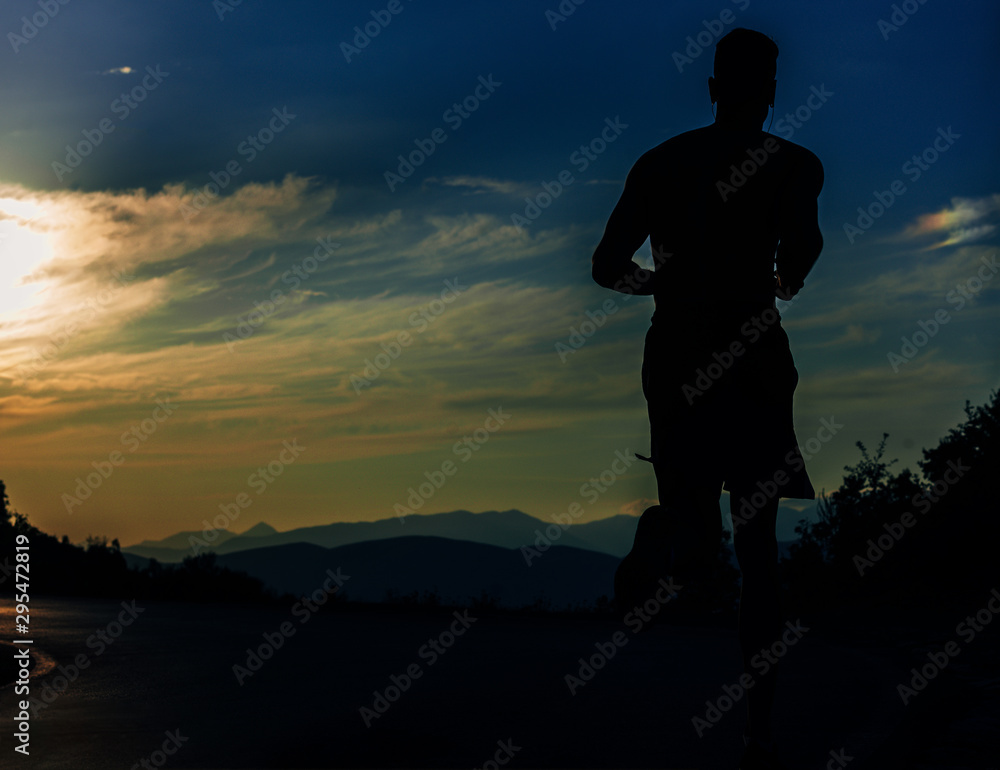 Sport running fitness man training towards goals Sport running fitness man training towards goals