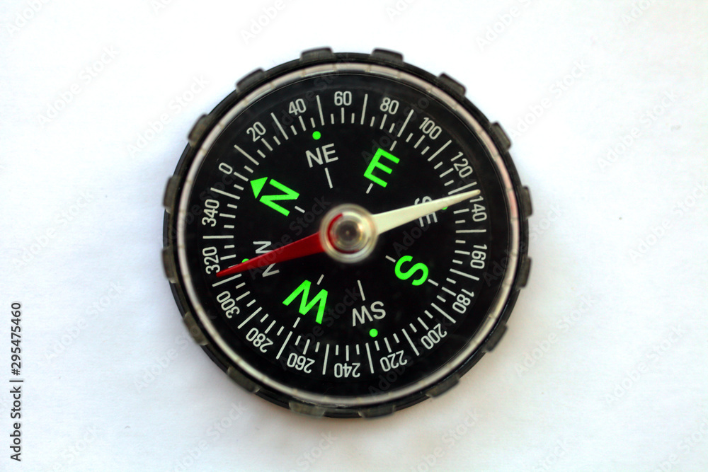 compass on a white background close-up compass on a white background close-up