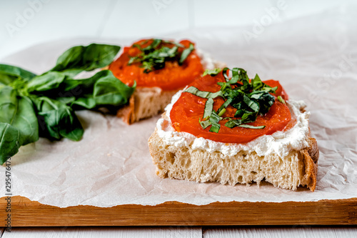 Tomato And Ricotta On Toast With Fresh Basil