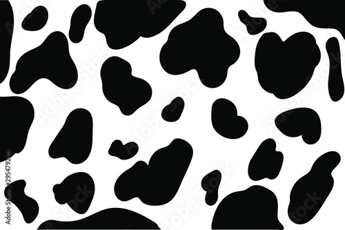 Black spots of a cow on a white background.Can be used for wallpaper, pattern fills, web page background, surface textures.