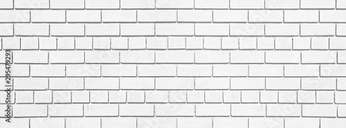 White brick long texture. Lime washed brickwork wide background. Light painted block wall abstract backdrop