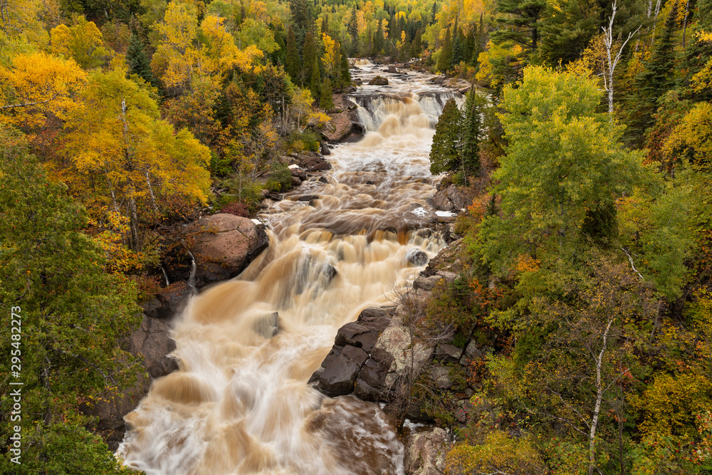 Obraz premium Beaver River Cascading Waterfall In Autumn