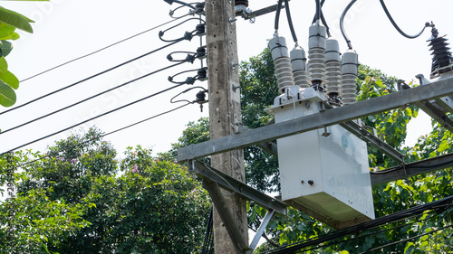 Electric pot with a wire on a pole photo