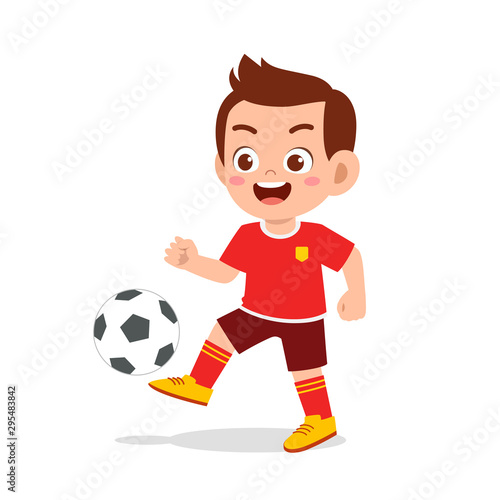 cute kid boy play soccer as striker