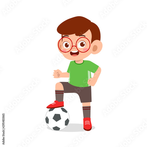 cute kid boy play soccer as striker