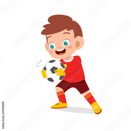 happy kid boy play soccer as goalkeeper