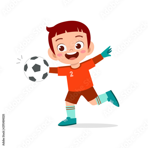 happy kid boy play soccer as goalkeeper