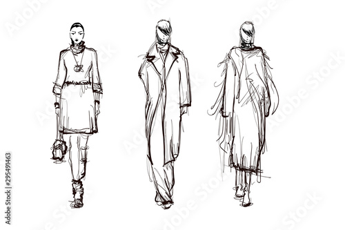 Beautiful young women. Hand drawn stylish woman portrait. Fashion lady. Winter outfit. Sketch. Fashion model posing in coat. Hand drawn fashion woman.