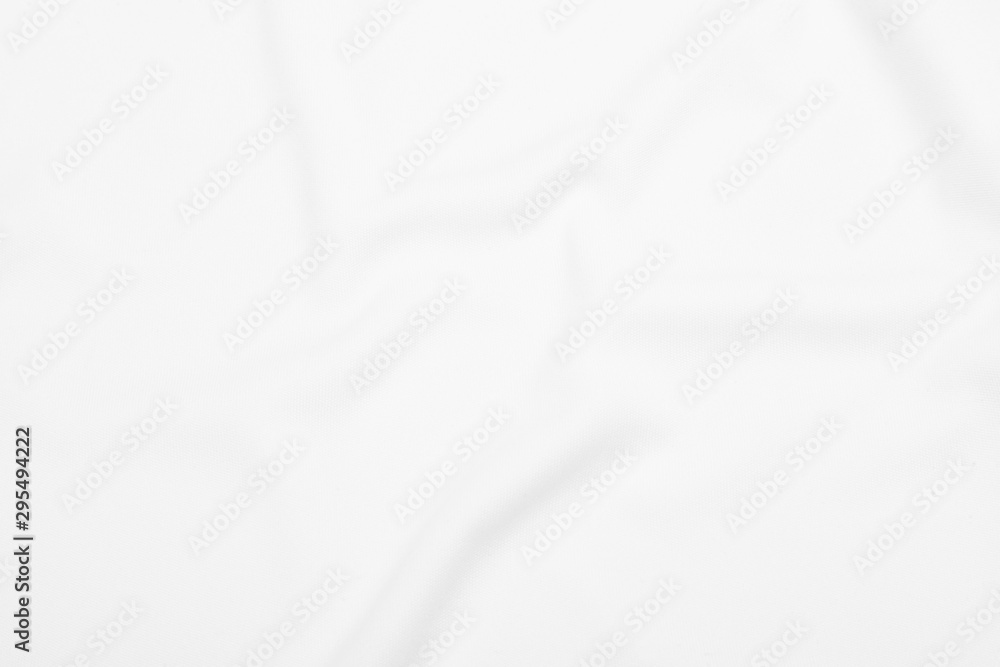 White fabric texture background with soft waves.