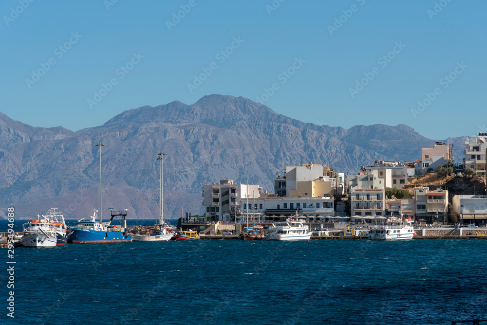 Agios Nikolaos, Crete, Greece. October 2019.  The waterfront of this attractive town on the Gulf of Mirabello. popular with visiting holidaymakers.