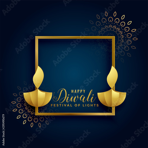 happy diwali golden background with two diya lamps