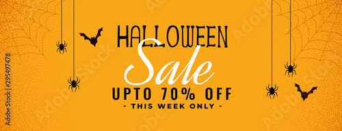 halloween yellow sale banner with spider and cobweb