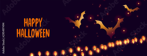happy halloween banner with glowing bats and lights