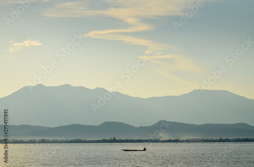 peaceful of lake with mountain view at Phayao lake in Thailand