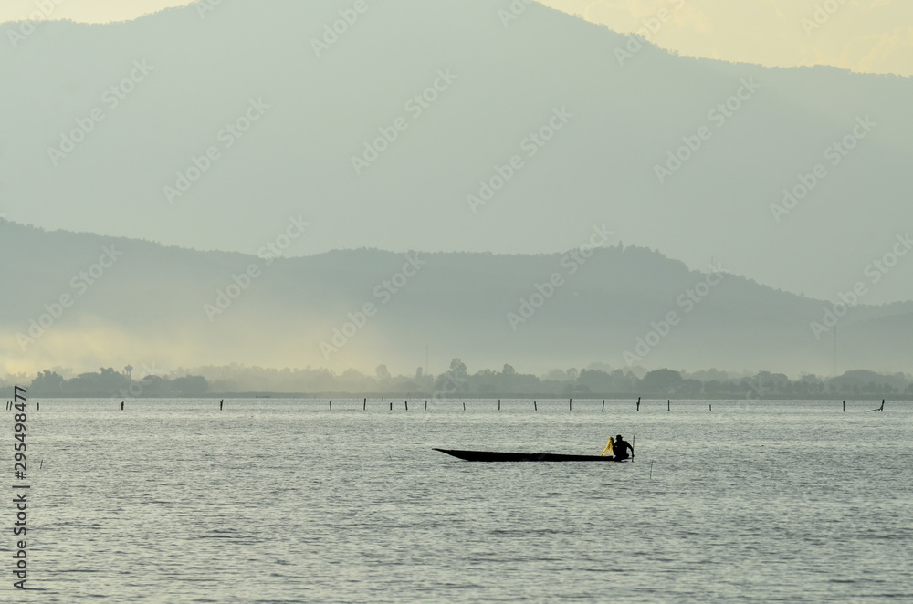peaceful of lake with mountain view at Phayao lake in Thailand