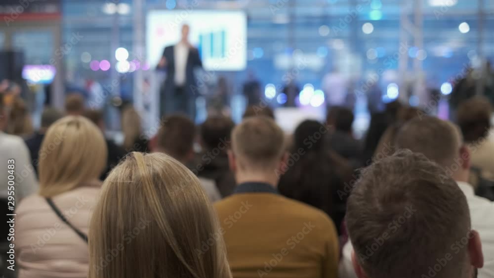 Audience listens lecturer at workshop