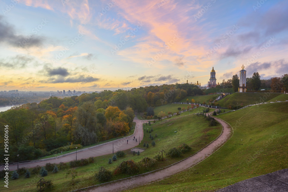 cloudy blue sky over the green park in Kyiv. Landscape shot. Park of Eternal Glory, Kiev.