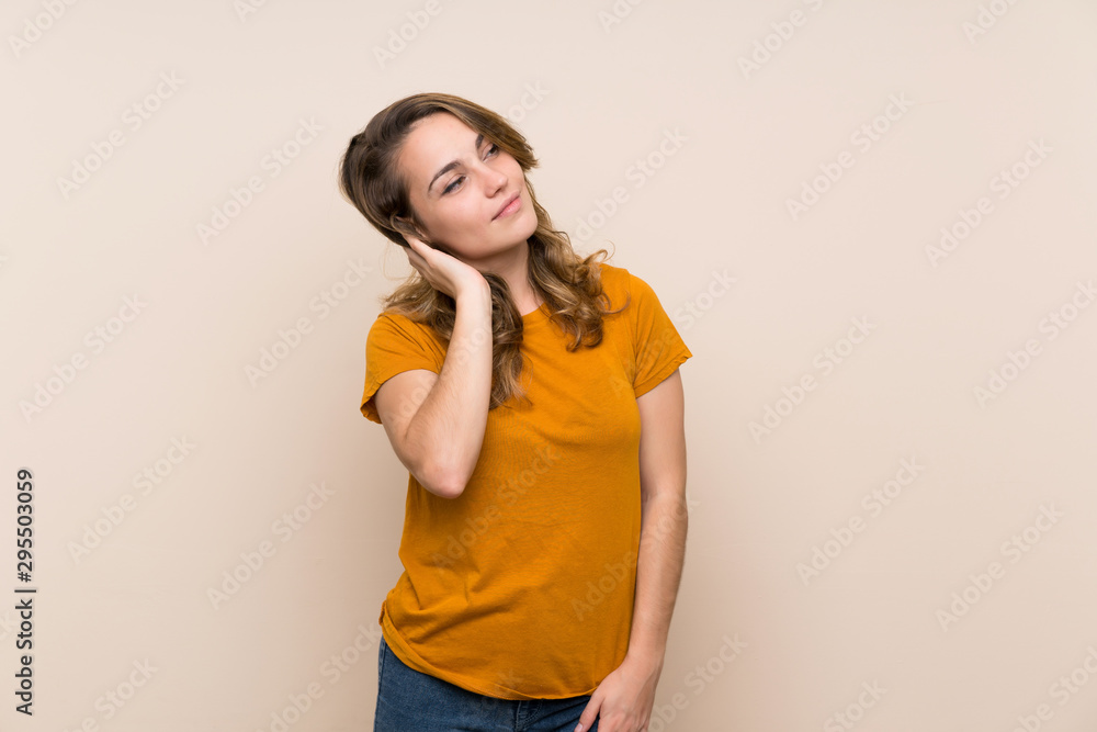 Young blonde girl over isolated background thinking an idea Young blonde girl over isolated background thinking an idea