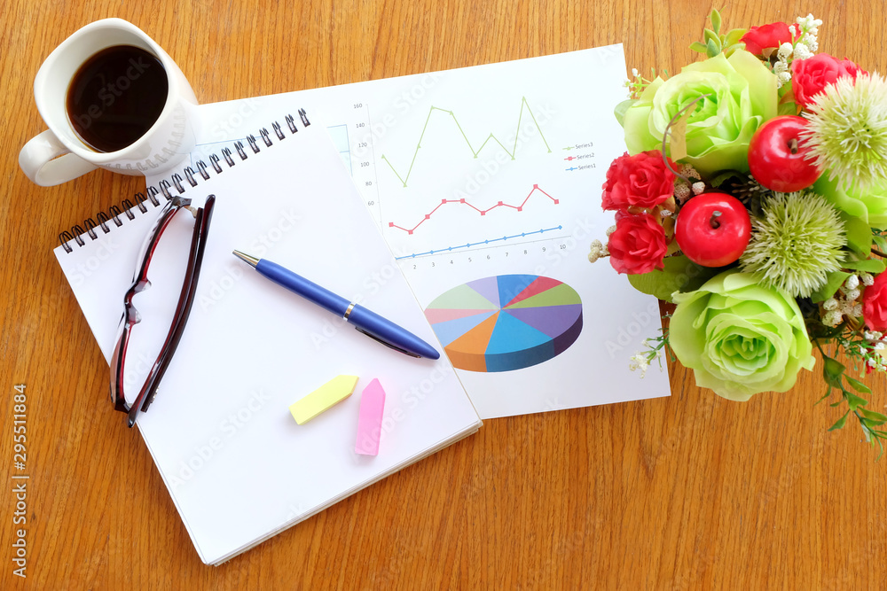 graph paper and note book in business concept graph paper and note book in business concept