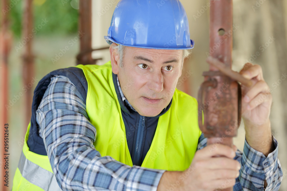 chemical industrial engineer working with pipes chemical industrial engineer working with pipes