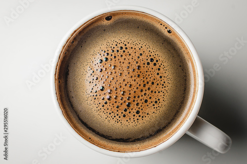 Top view of a cup of coffee. Coffee foam isolated on white background with clipping path. © Тарас Яковлев