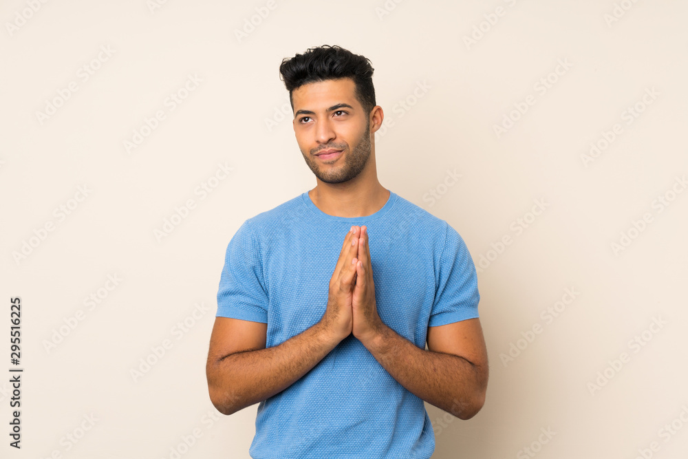 Young handsome man over isolated background scheming something Young handsome man over isolated background scheming something
