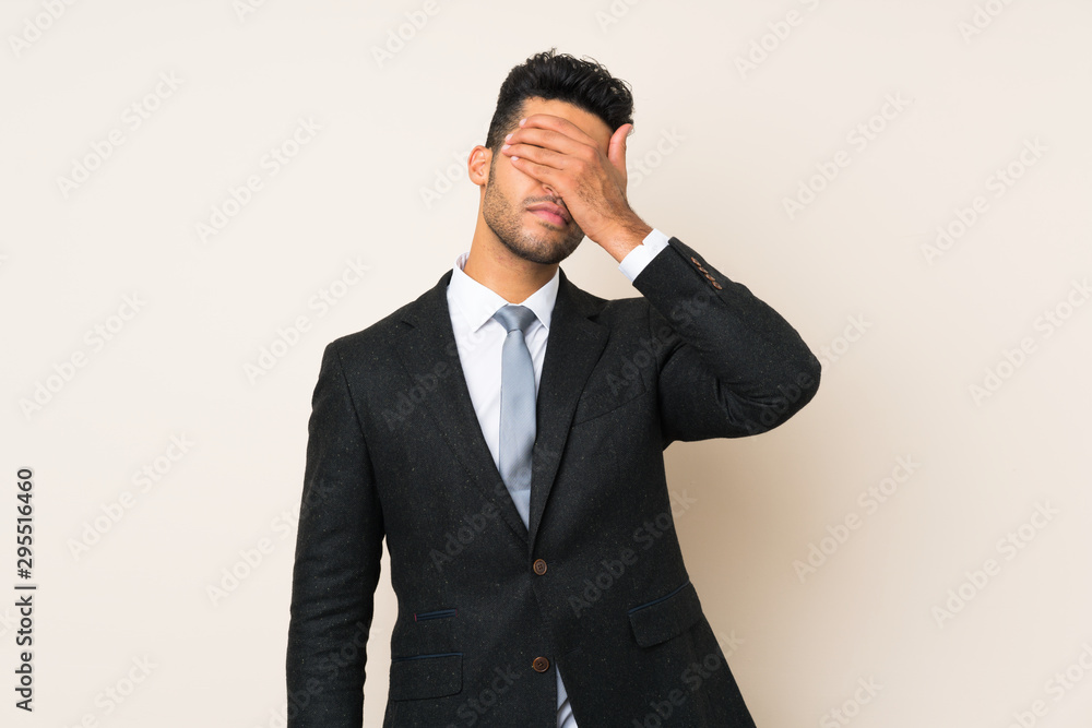 Young handsome businessman man over isolated background covering eyes by hands Young handsome businessman man over isolated background covering eyes by hands