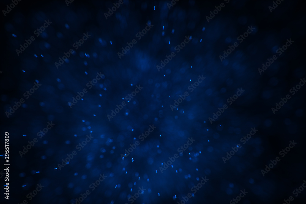 Flowing and glowing particles with dark background, 3d rendering