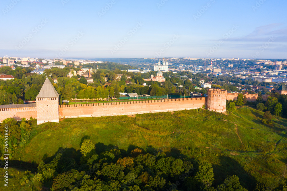 Towers of Smolensk fortress wall. The southern wall of the Smolensk Kremlin and a panorama of the city of Smolensk from a flight height, Russia.