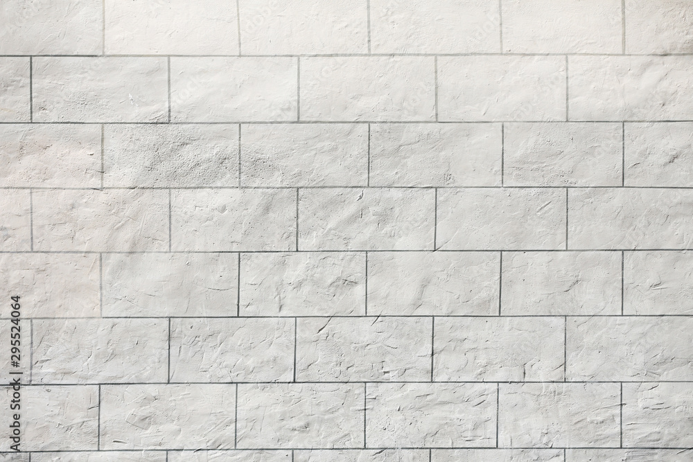 Naklejka premium light stone wall. for background.