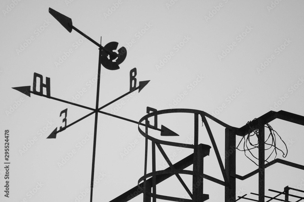Weather vane in an old factory Weather vane in an old factory
