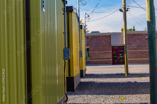Yellow Portable Classrooms Outside an Elementary School
