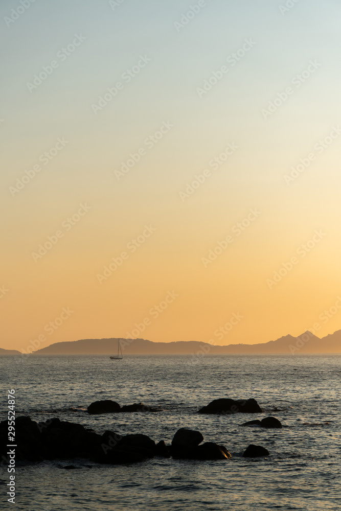 Sailboats on the Vigo estuary at sunset