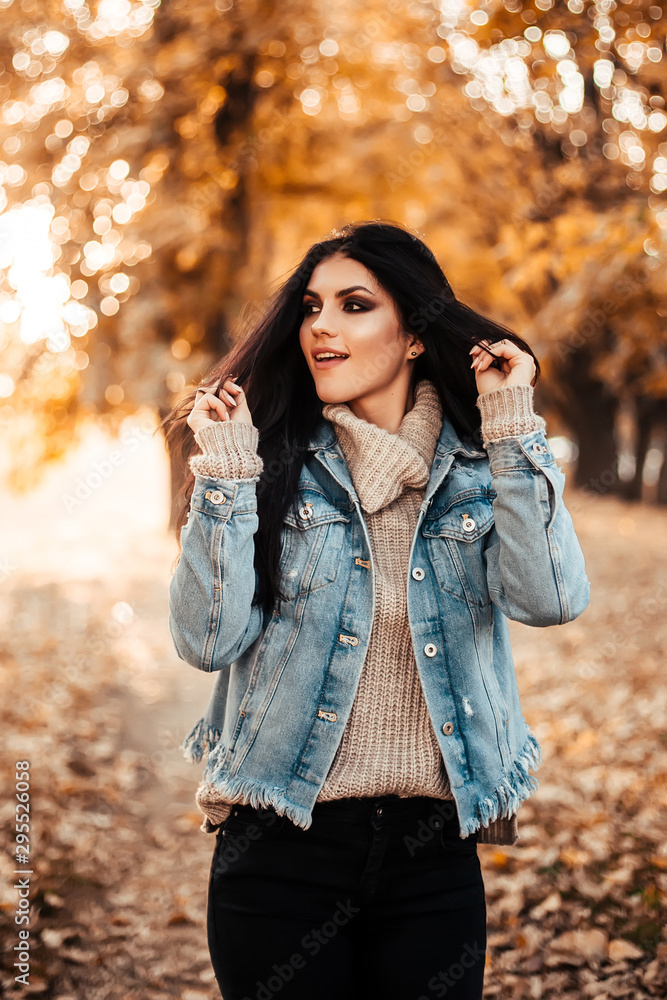 Beautiful woman walking in the park. Beautiful woman walking in the park.