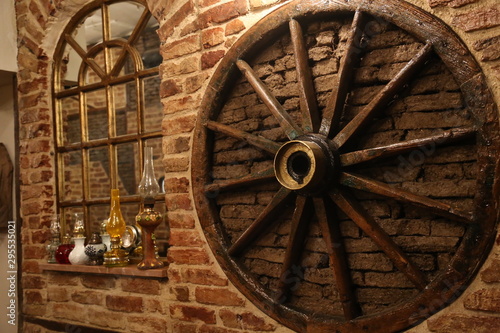 old wooden wheel on the wall