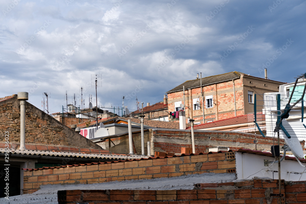 View over roofs of half built houses and antennas in Spain View over roofs of half built houses and antennas in Spain