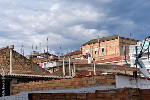 View over roofs of half built houses and antennas in Spain