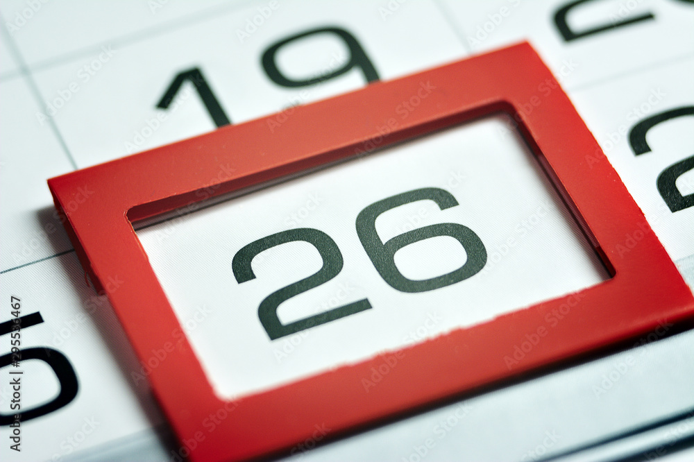 twenty-sixth of the month highlighted on the calendar with a red frame close-up macro, mark on the calendar, twenty-sixth date twenty-sixth of the month highlighted on the calendar with a red frame close-up macro, mark on the calendar, twenty-sixth date
