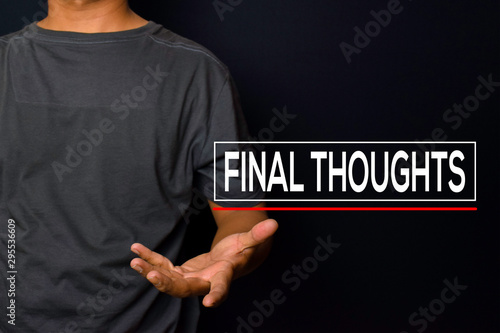 Young man with Final Thoughts text isolated on black background photo