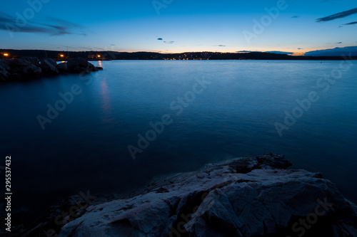 Scenic night view of the Croatian coastline, seen from a beach near Soline on Krk island, Croatia, during blue hour