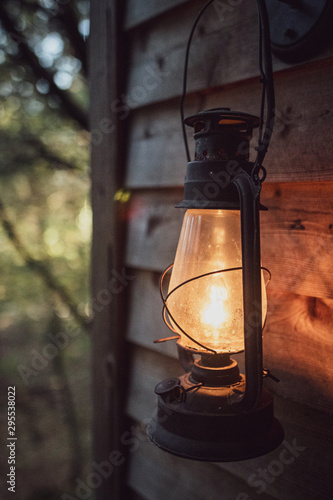 Lantern porch light  in the woods close up