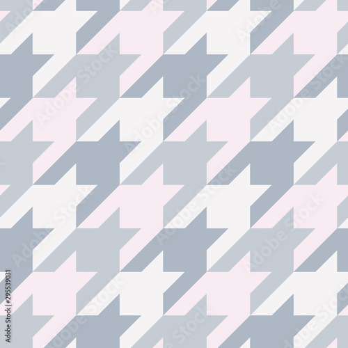 Seamless surface pattern with houndstooth ornament. Classic fashion fabric print. Checked geometric background.