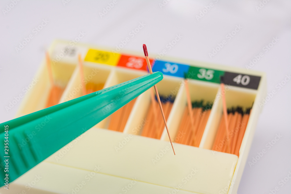 guttapercha pins in a set of different sizes for root canal fillings