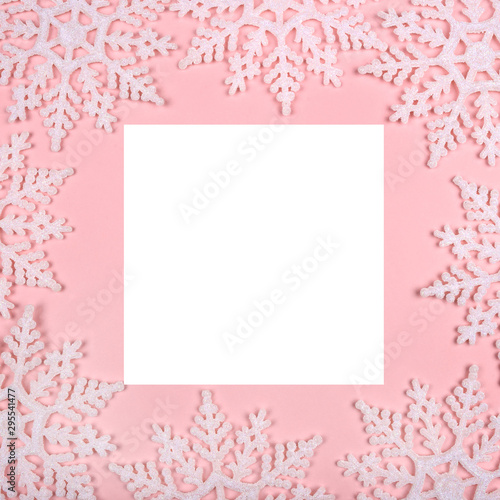 Wallpaper Mural Winter pattern made of snowflakes and on pink background. Christmas concept. Flat lay. Copy space for your text. Torontodigital.ca