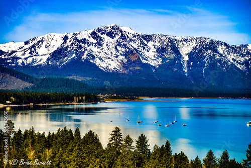 Lake Tahoe in the spring with snow covered Sierra Nevada Mountains