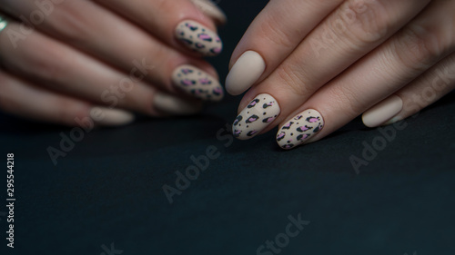 Nails Art Design. Hands With Manicure. Close Up Of Female Hands With Trendy Nails with decorations.