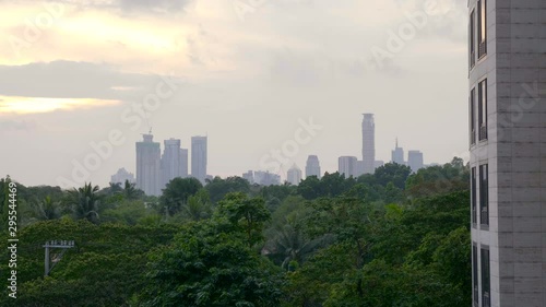 Dramatic clouds and the beauty of nature along with modern civilization, View of nature with a cityscape in the background. photo