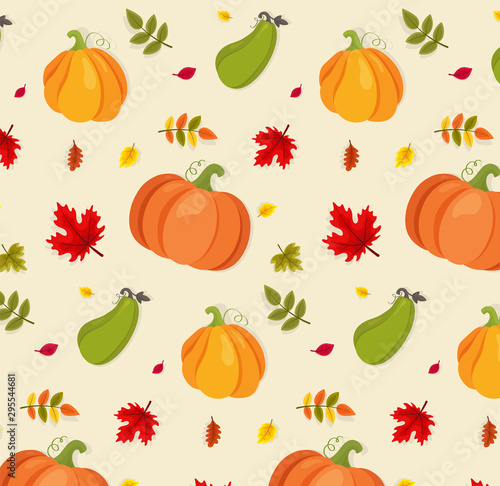 Autumn pattern with pumpkins with colorful leaves.